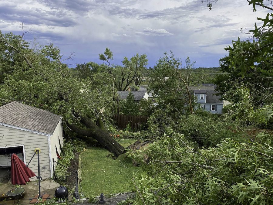 "I watched into our backyard as our 150 year old oak tree collapsed from the wind and destroyed our garage. It just didn’t let up,” explained Welch. (Courtesy of Jon Welch)