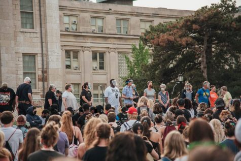 The Iowa City City Council speaks at an IFR protest at the Pentacrest. 