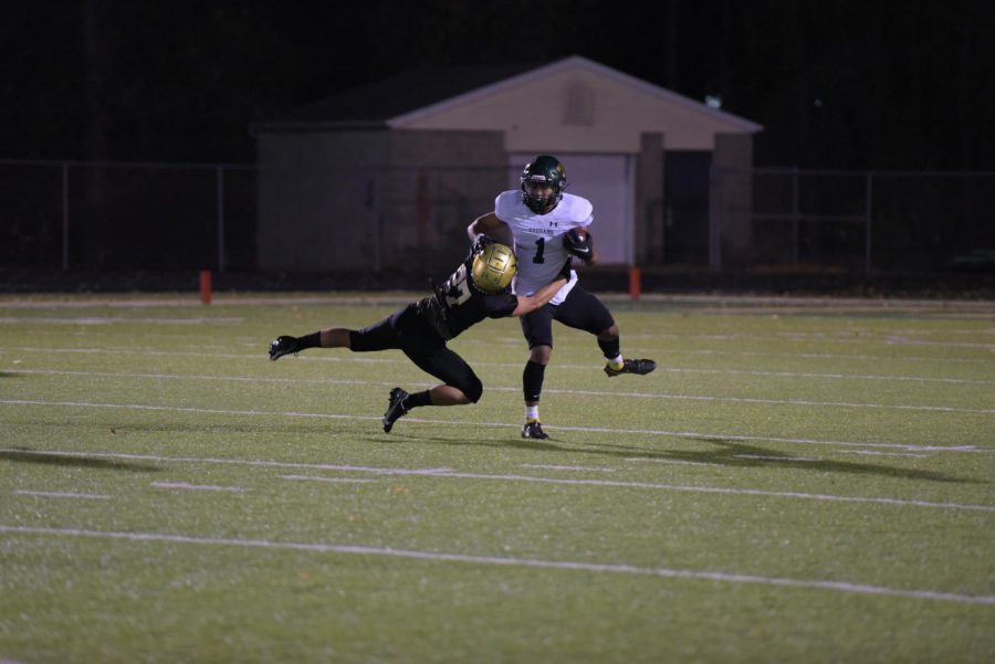 Boaz Abramoff 22 tackles Demarcus Ray 21 off a punt return at West on Oct. 10. 