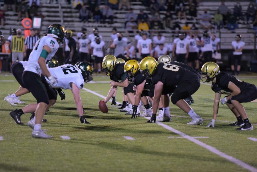 The Trojan offensive lineman get ready for the snap against Kennedy on Oct. 10.