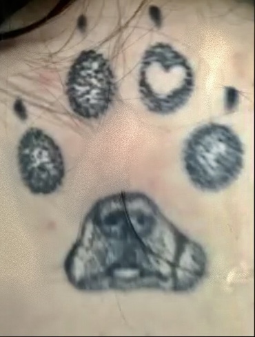 Sydney McDermotts tattoo honoring her old dog.