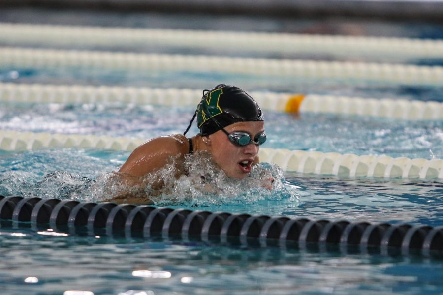 Makala Hajek '23 swims the 200 IM at Mercer Park Aquatic Center on Oct. 17.