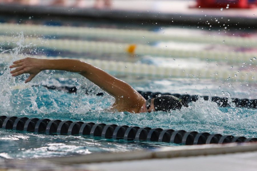 Aurora Roghair '21 swims in the 400 free Relay at the Mercer Park Aquatic Center Oct. 17.