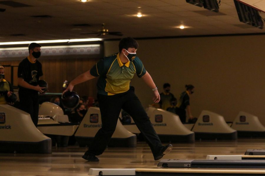 Nathan Jones '22 looks to bowl a strike against Kennedy on Dec. 18.