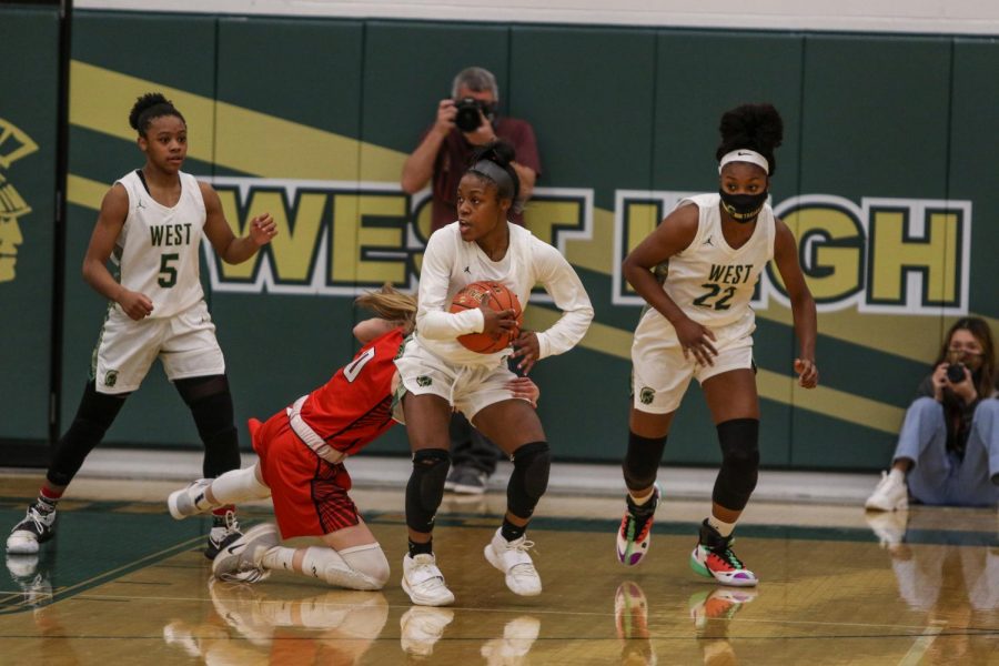 Matayia Tellis '21 comes up with a steal against City High on Dec. 18.