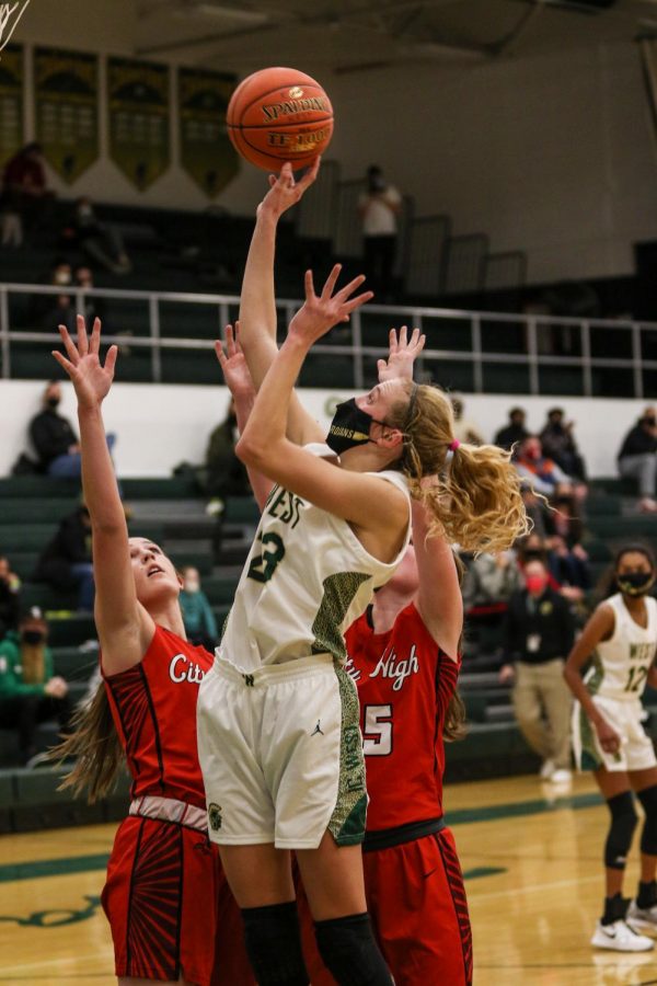 Audrey Koch '21 goes up for a layup against City High on Dec. 18.