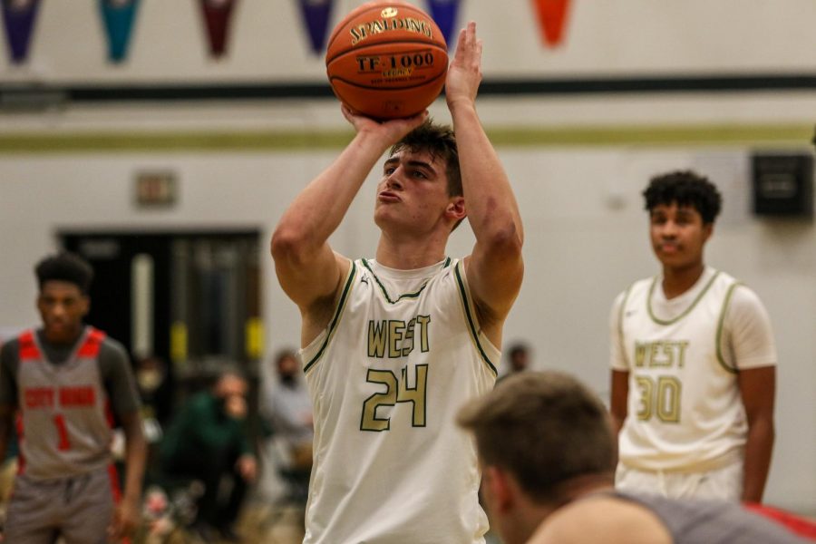 Grahm Goering '21 knocks down two free throws against City High on Dec. 18.