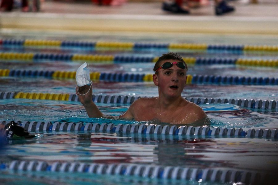 Max Gerke '24 swims his mask to the other end of the pool during a dual meet against Cedar Rapids Washington on Jan. 14.