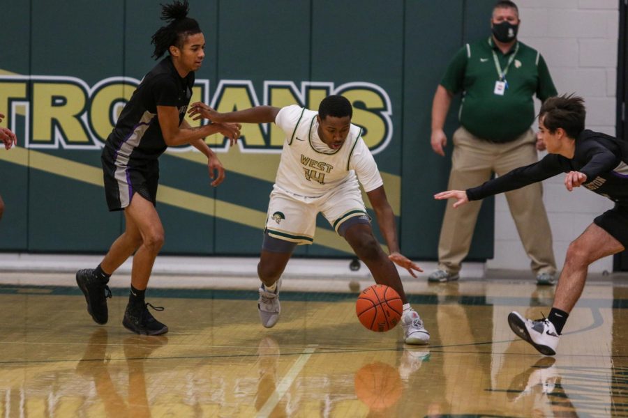 Mikey Brown '21 comes up with a steal against Burlington on Jan. 2.