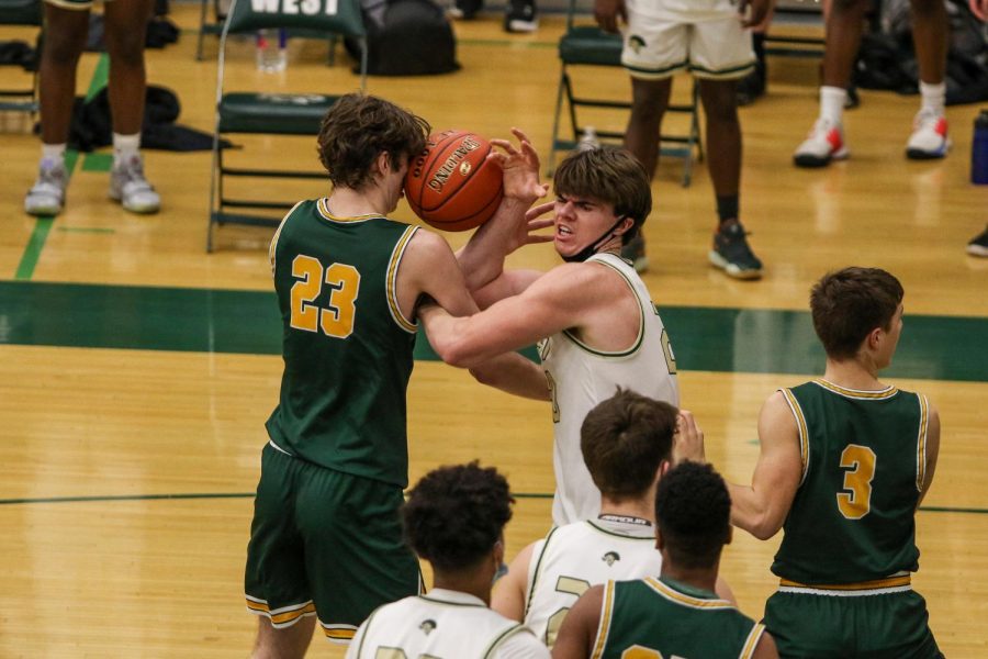 Pete Moe '22 fights for a rebound against Kennedy on Feb. 11.