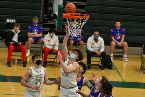 Pete Moe 22 goes up for a layup against Cedar Rapids Washington on Feb. 16.