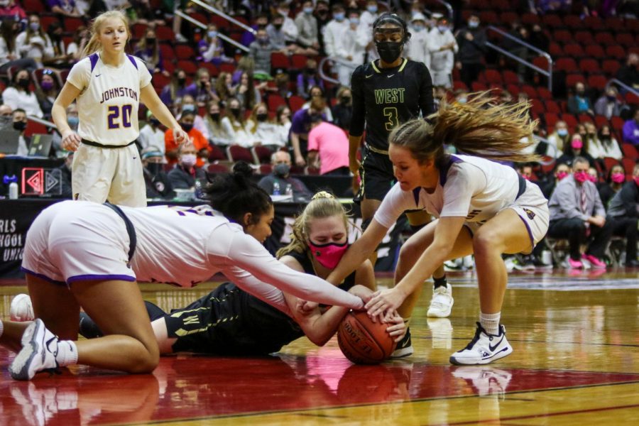 Anna Prouty '23 fights for a loose ball during the state semifinal game against Johnston on March 4.