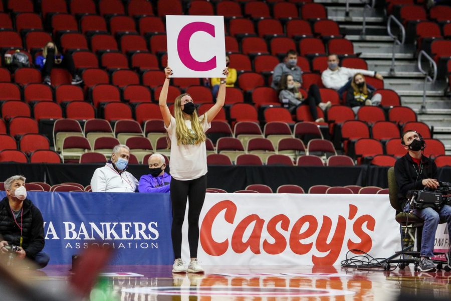 Kenzie Donovan '21 competes in a trivia game at halftime of the state semifinal game against Johnston on March 4.