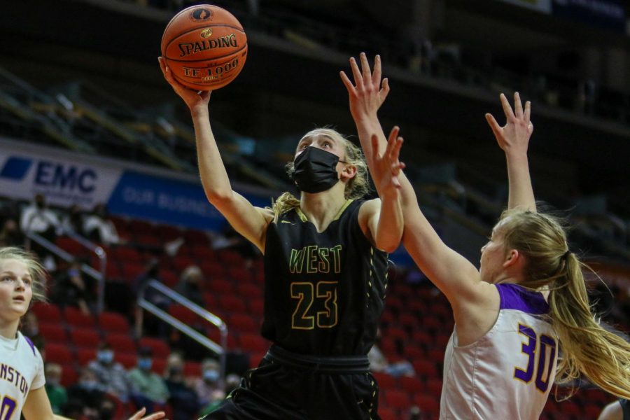 Audrey Koch '21 goes up for a layup during the state semifinal game against Johnston on March 4.