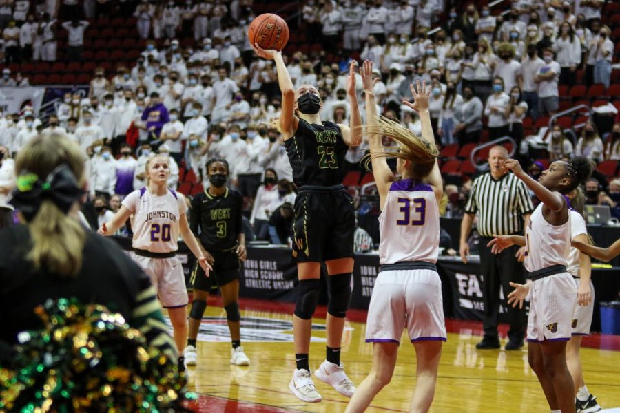 Audrey Koch '21 shoots a floater with seconds left in the state semifinal game against Johnston on March 4.