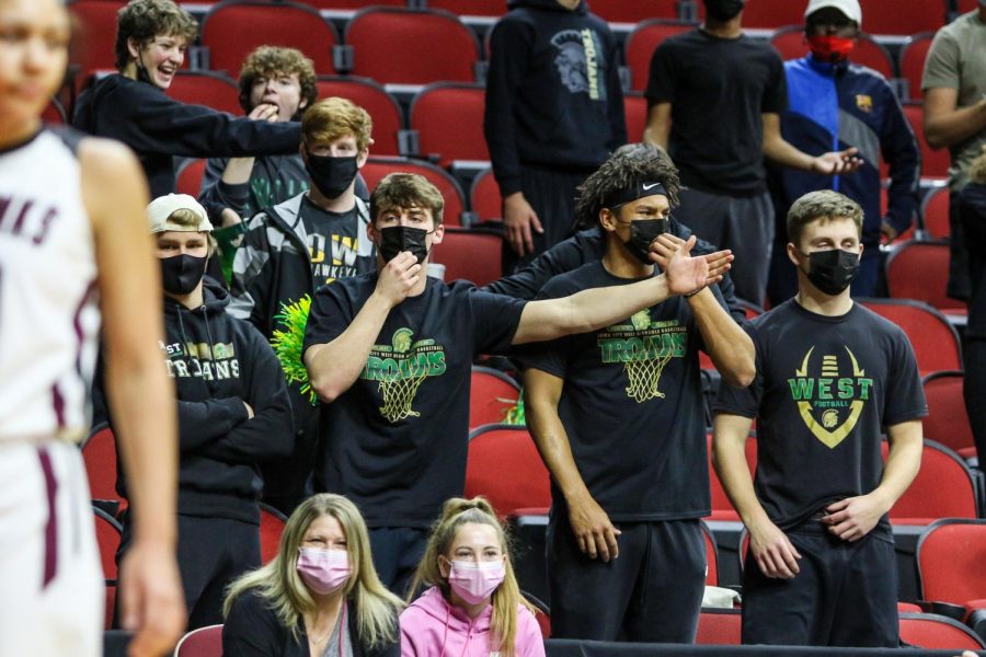 Grahm Goering '21 and the student section question a call during the state quarterfinal game against Waterloo West on March 1.