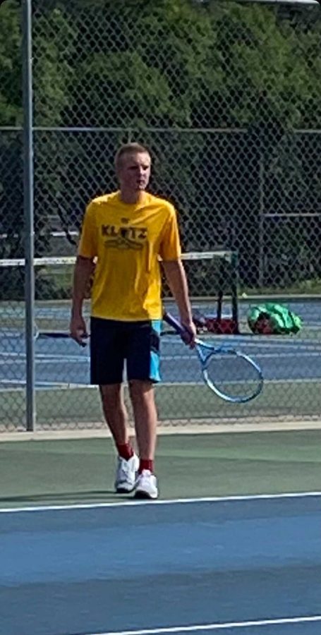 Gerke 24 plays tennis at a tournament in Iowa City.