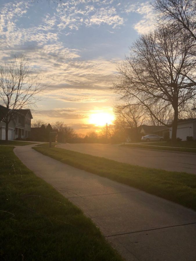 The sun sets over Foxana Drive at 7:33 PM. A particular perk to spring that many look forward to are the longer days caused by the Earth’s tilt towards the sun. “My mood is always higher when the days are longer” Christina Weitz an ELL teacher at West says.