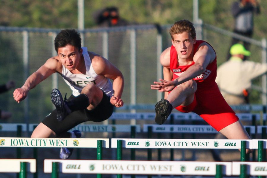 Jason Lu '21 fights to place in the 110 meter hurdles during the Eastern Iowa Track and Field Festival on April 12.