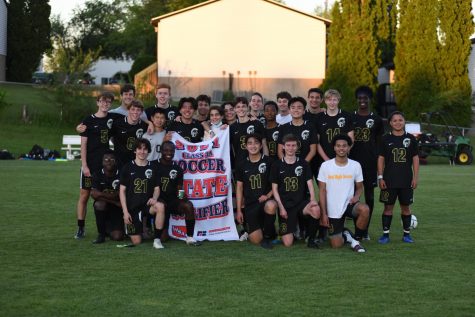 The boys soccer team poses for a picture after qualifying for the state tournament on May 26. 