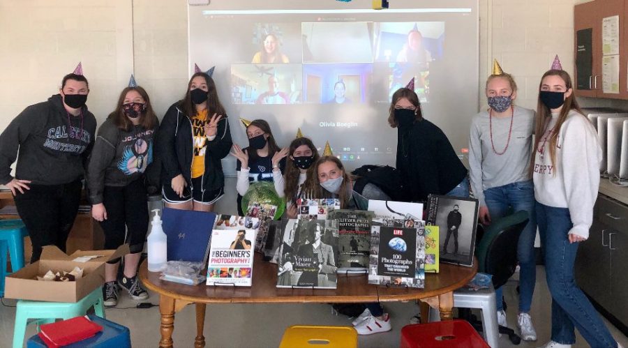 The yearbook staff celebrating the completion of the 2021 yearbook on April 2. This years staff is combined in-person and online students.