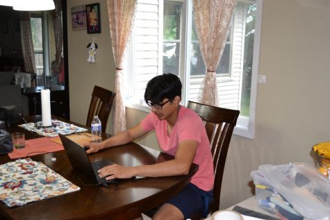 Bivan Shrestha ’22 works on the last assignments of the school year.