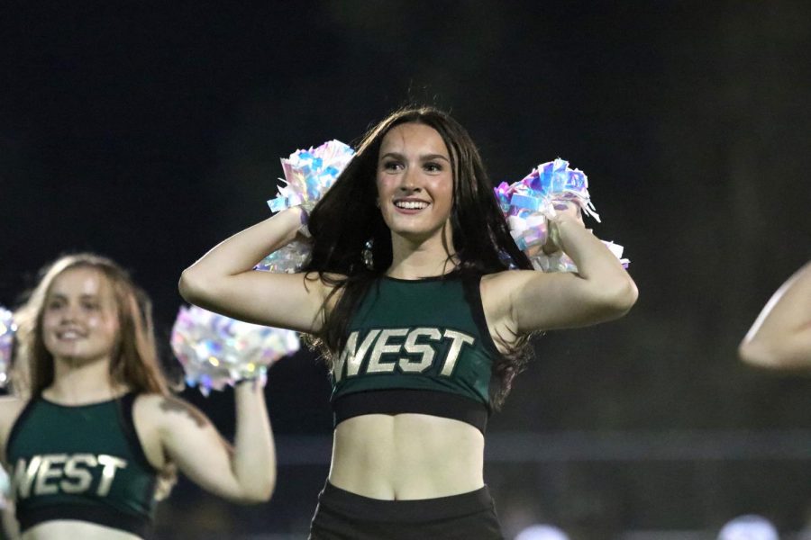 Leigha Pacha 22 performs at halftime with the West High Poms.