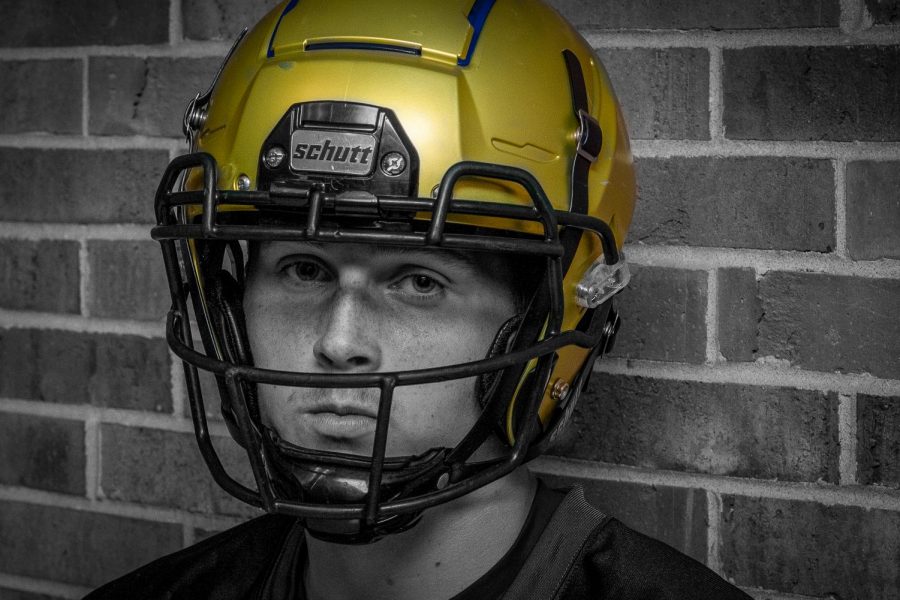 Jack Wallace '25 poses for a photo outside of the varsity locker room after practice on Sept. 16.