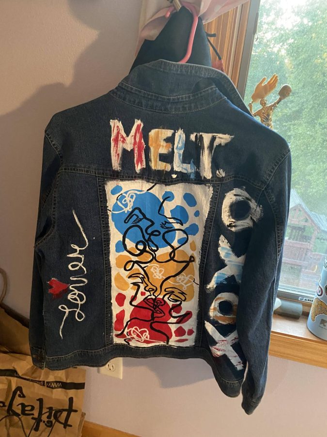 A jean jacket painted on by Jay Mascardo.