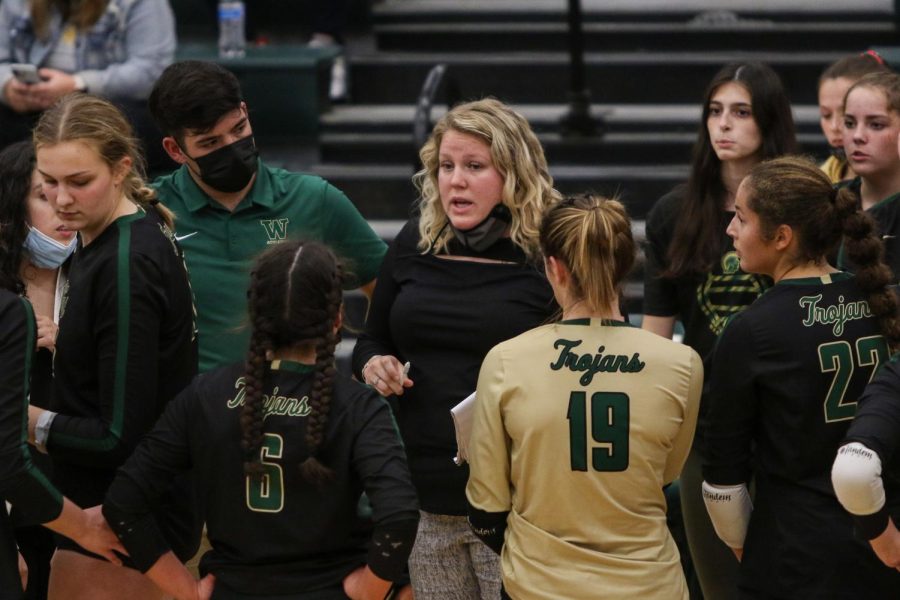 Head coach Keeley Arnold adresses her players during a timeout on Oct. 21 during the regional semifinal against Bettendorf.