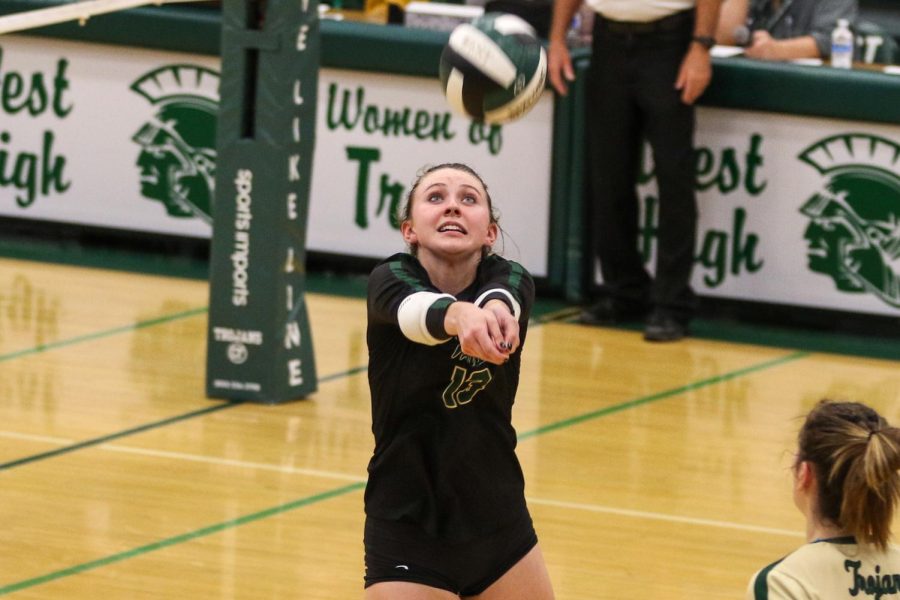 Emma Dunlap '22 bumps the ball back into play on Oct. 21 during the regional semifinal against Bettendorf.