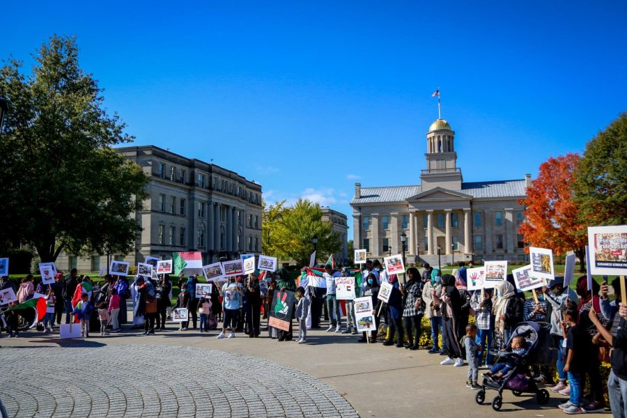 Protesters gather at the Pentacrest in downtown Iowa City on Oct. 30 while protesting the military coup in Sudan.