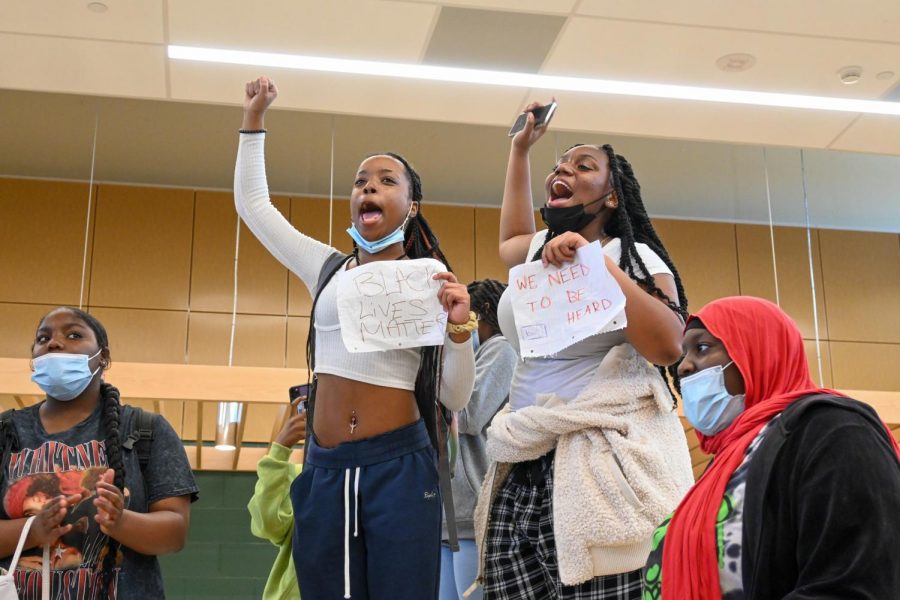 Miracle Hall 23 and Rakyra Mcclendon ’24 chant for change at the protest.