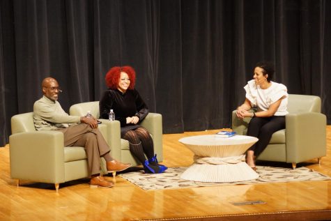 Nikole Hannah-Jones, Reverend Ray Dial and Akwi Nji converse on stage. 