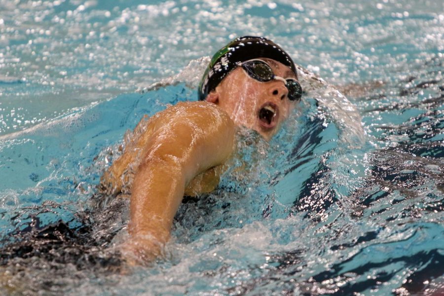 Kolby Reese '24 swims the 500 yard freestyle during the IGHSAU State Swimming and Diving Championships in Marshalltown on Nov. 13.