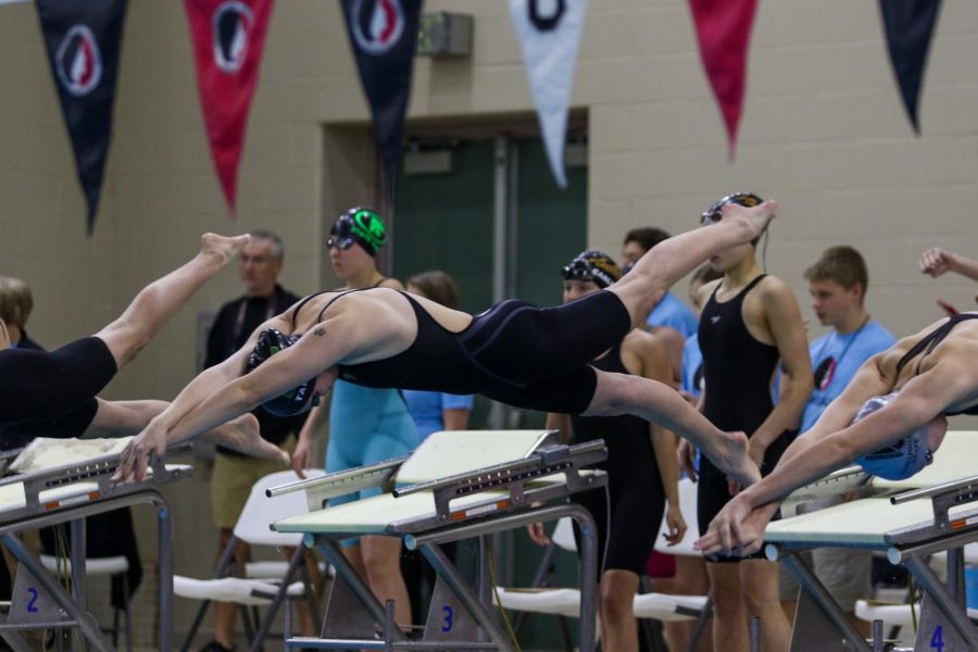 Olivia Taeger 22 leads off the 400 yard freestyle relay during the IGHSAU State Swimming and Diving Championships in Marshalltown on Nov. 13.