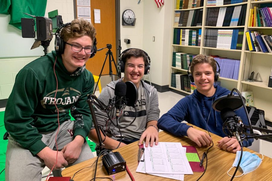 Juniors Ryne Vander Leest, Ryan Goodman and Owen Larson pose for a photo before recording a podcast on Dec. 14.