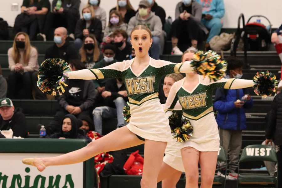 A performer spins like a top during the Poms halftime performance on Jan. 21. 