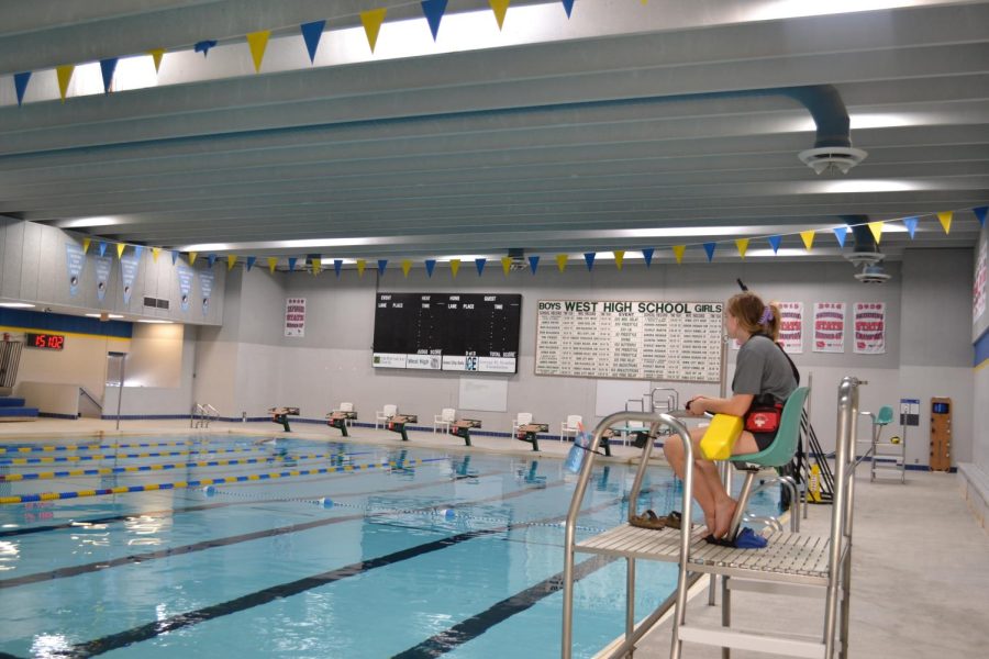 Maddie Caylor ’22 lifeguarding at the Coralville indoor pool.