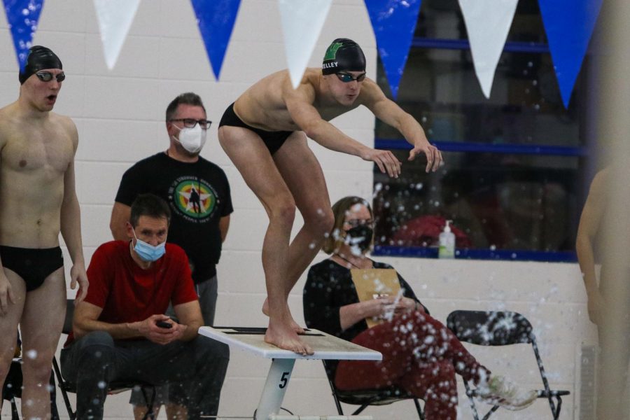 Boyd Skelley 22 prepares to swim his leg of the 400 yard Freestyle Relay during the annual Battle for the Golden Speedo on Jan. 18.