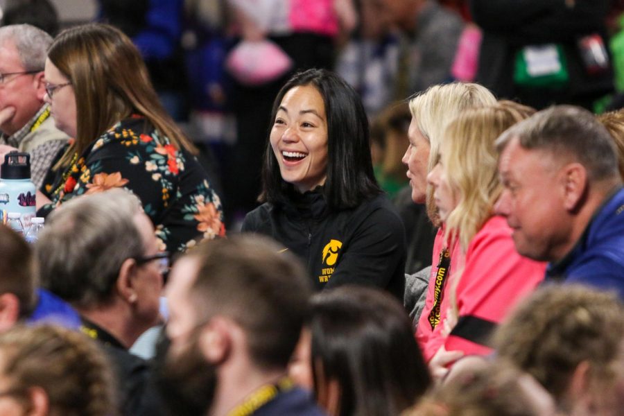 Univeristy of Iowa womens wrestling coach Clarissa Chun watches some wrestling at the Xtream Arena in Coralville during the 2022 girls state wrestling tournament on Jan. 22.  