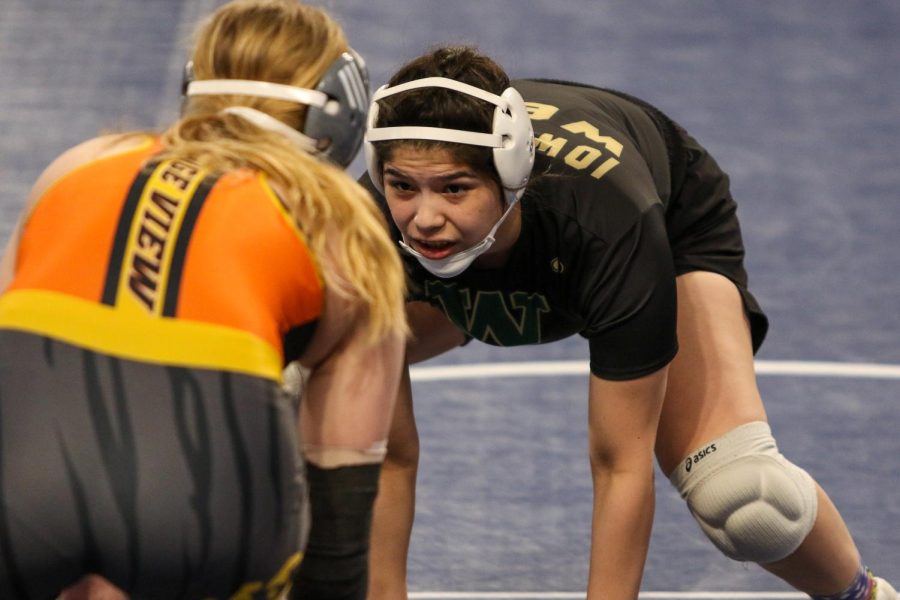 Jannell Avila 23 wrestles Ridge Views Isabella Deeds 22 in the semifinals at the Xtream Arena in Coralville during the 2022 girls state wrestling tournament on Jan. 22.  