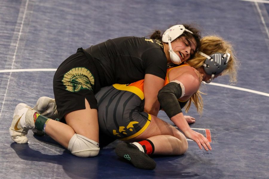 Jannell Avila 23 takes down Ridge Views Isabella Deeds 22 in the semifinals at the Xtream Arena in Coralville during the 2022 girls state wrestling tournament on Jan. 22.  