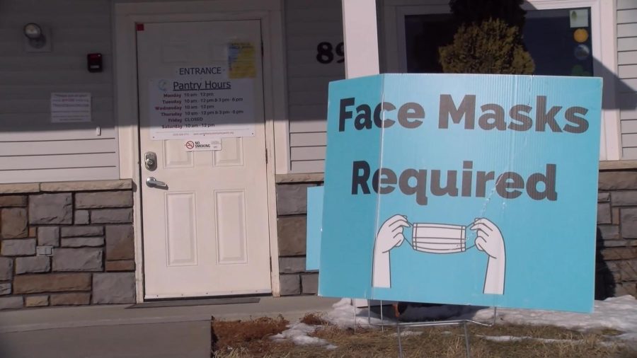 The North Liberty Food Pantry requires masks along with other health restrictions to continually provide for the community.