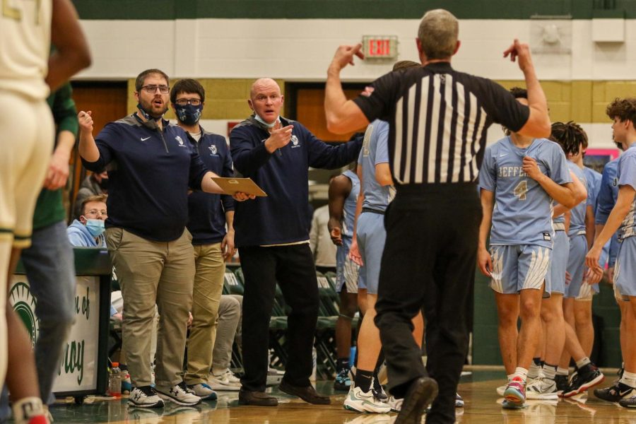 The Jefferson coaching staff questions the referee on Feb. 8. 