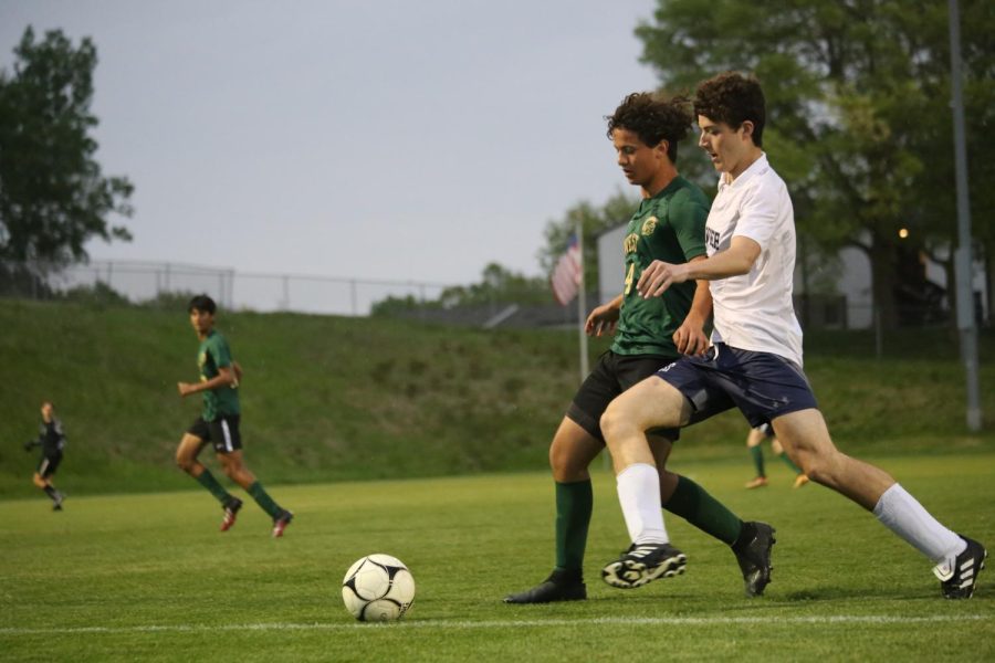 Haider Nasr 24 fights for possession against Xavier on May 17. 