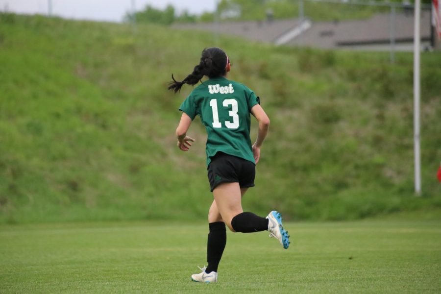 Hanah Kitamoto 22 sprints down the field on offense on May 20. 