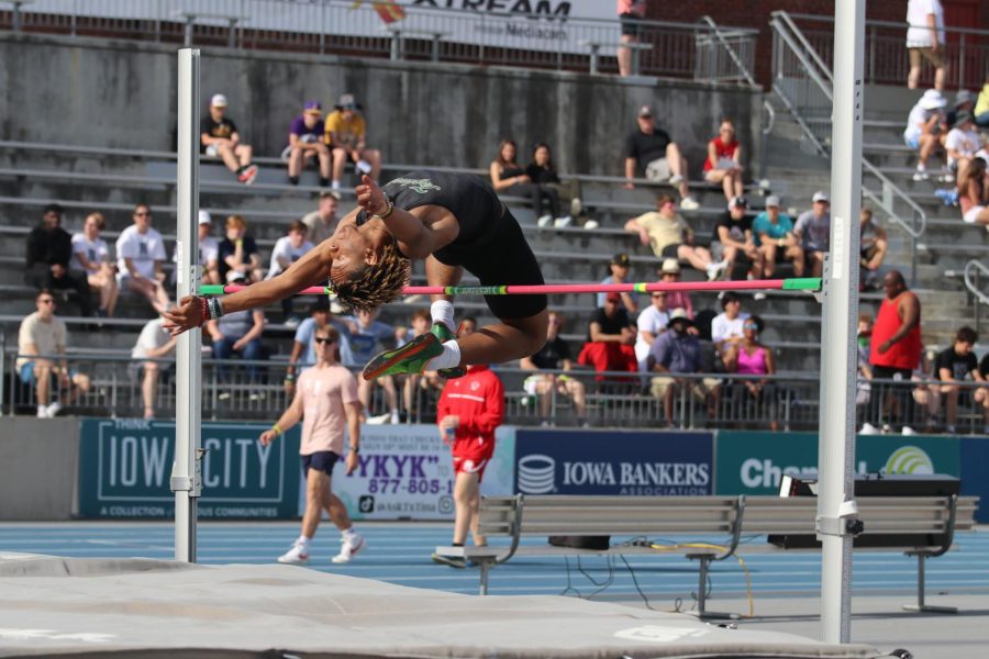 Daniel Robinson ’24 acrobatically clears 5-10.00 in high jump on May 19.
