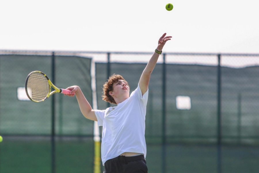 Patrick Selby 24 serves the ball during the IHSAA District Tennis Tournament at West High on May 9.