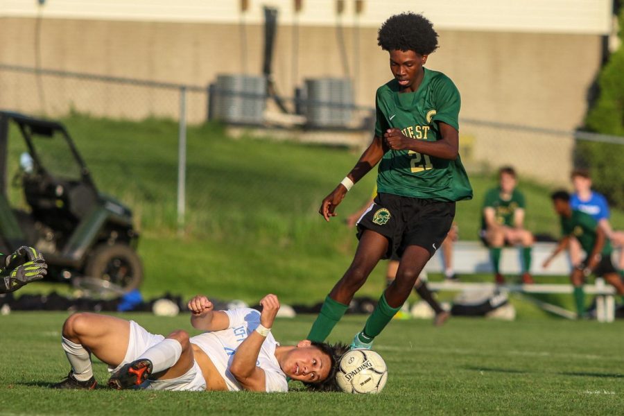 Ismail Mohamed 24 avoids a defender while trying to score against Jefferson on May 13.